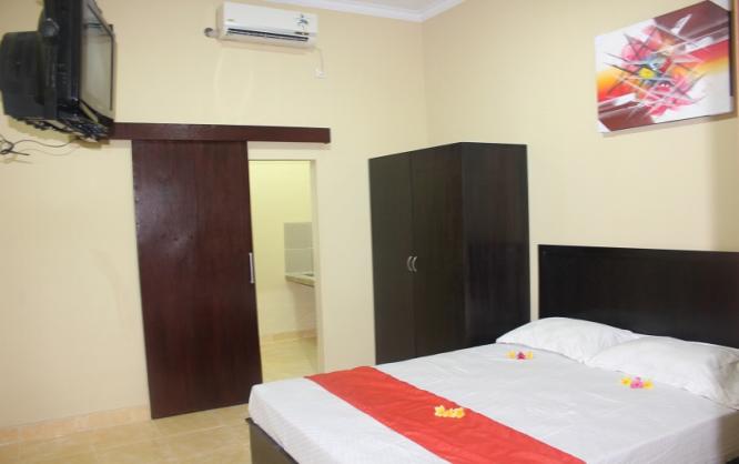 Wisma Santini 2 Type Delux Room Image