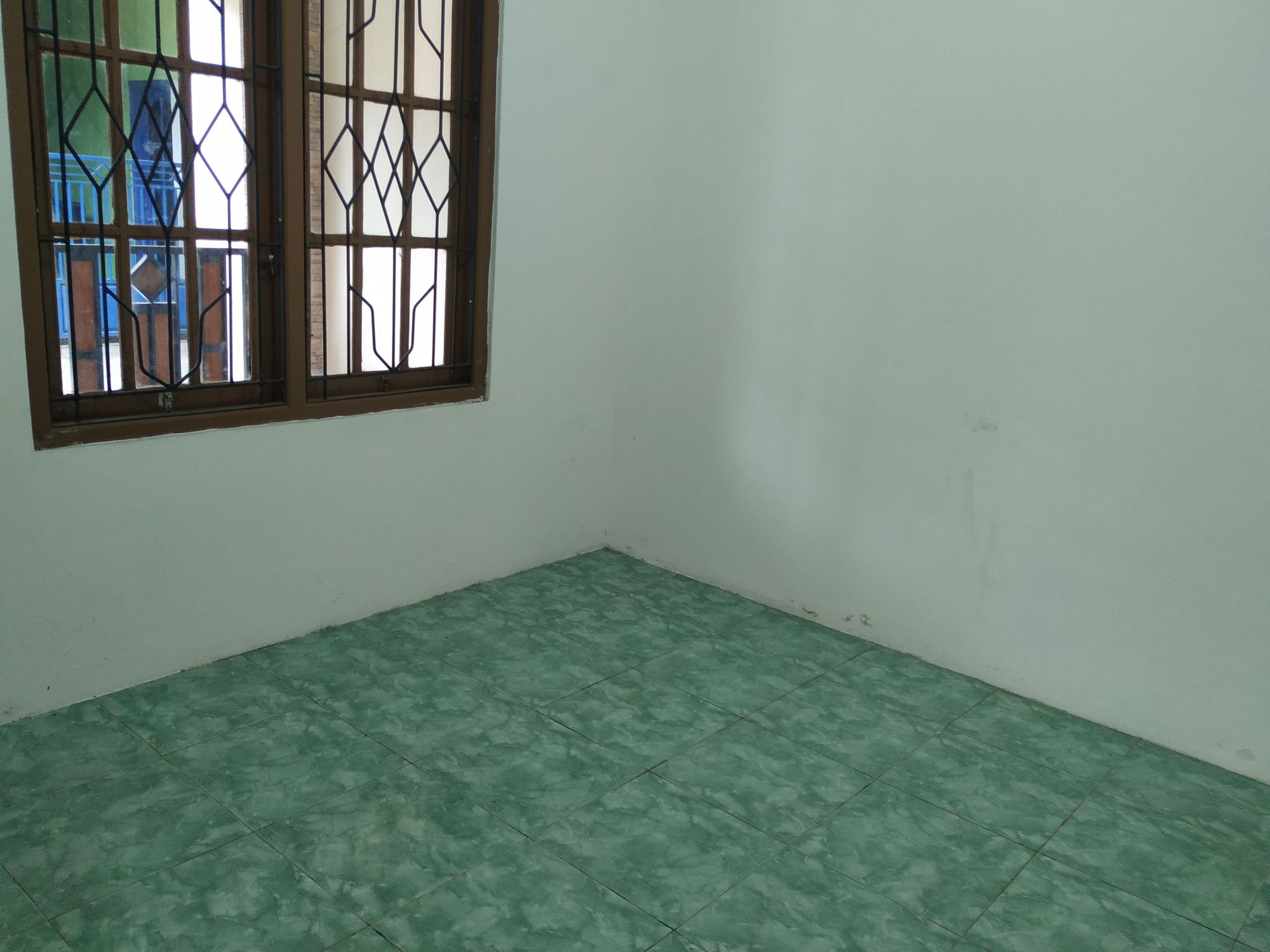 Kost Depan Pohon Rambutan Image