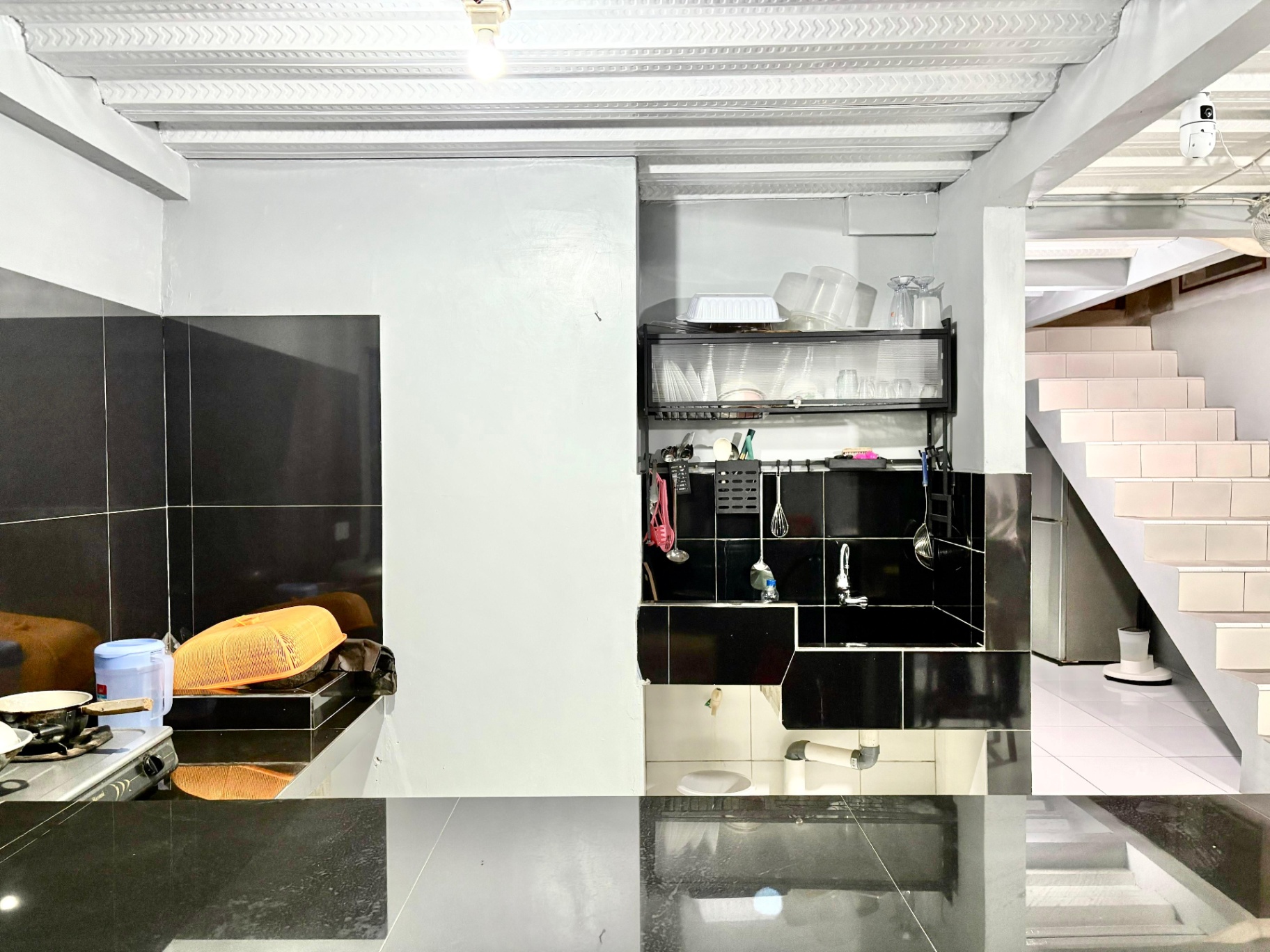 Djuragan Kamar - Kost Weni Living Image