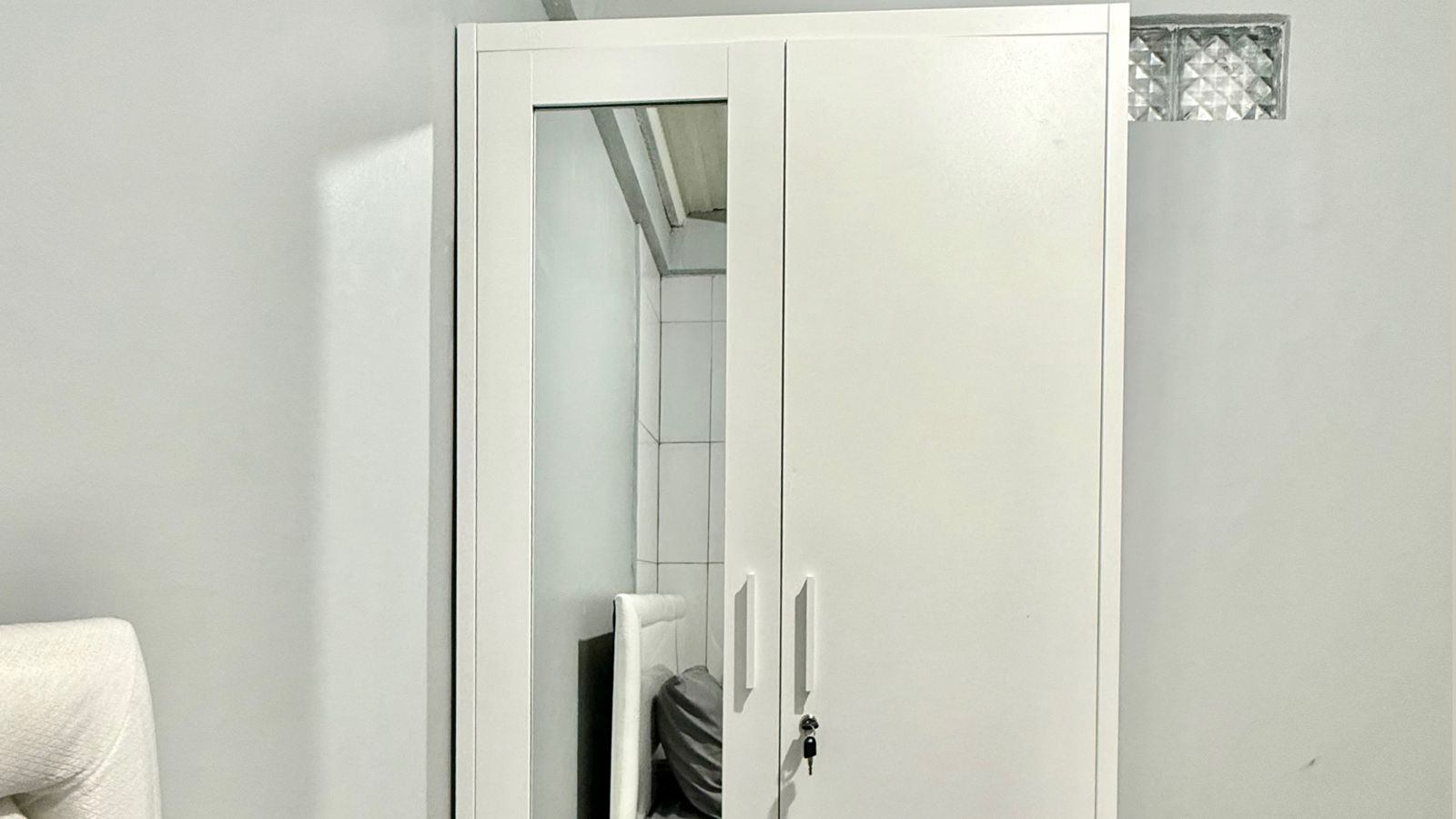 Djuragan Kamar - Kost Weni Living Image