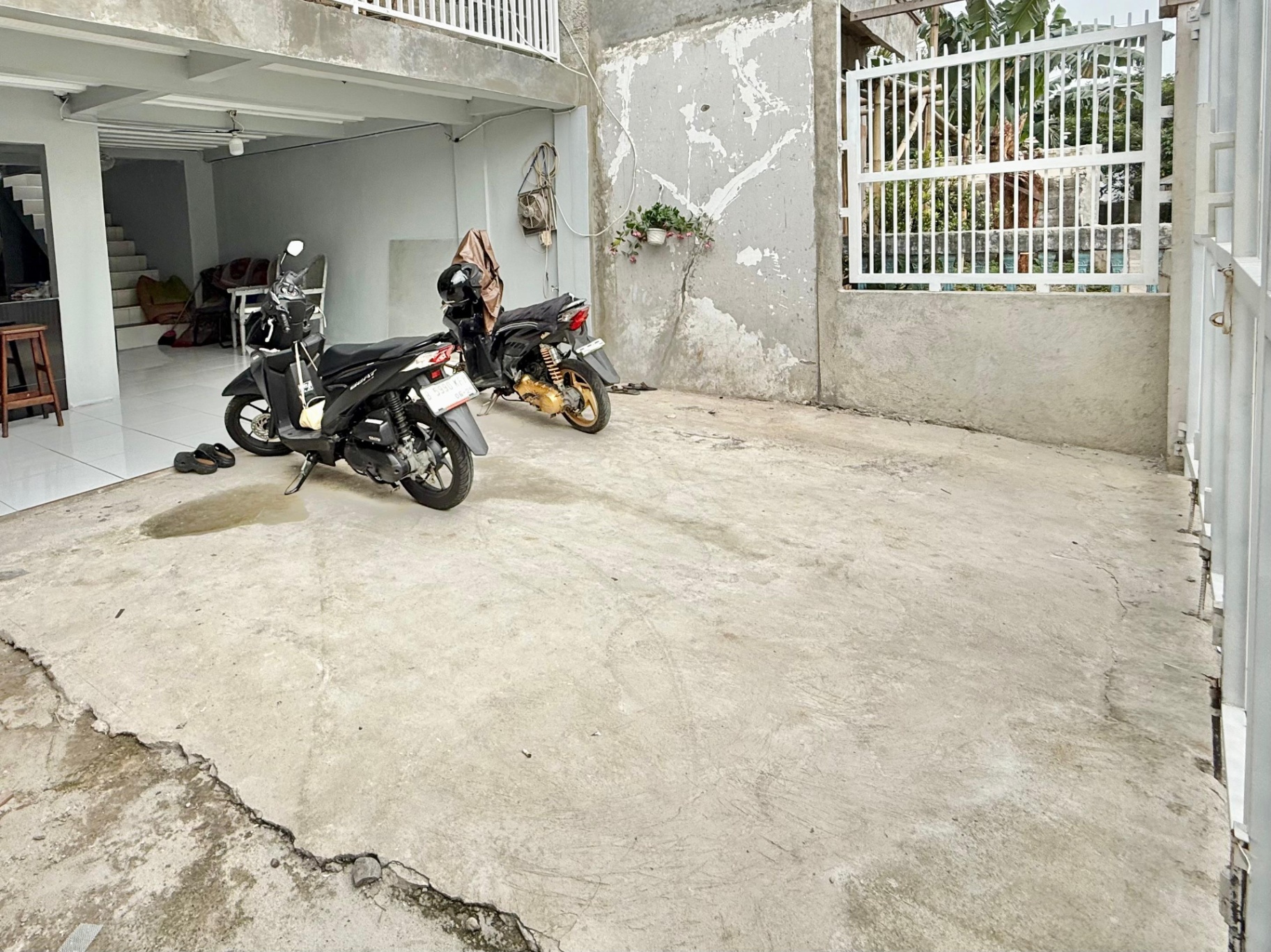 Djuragan Kamar - Kost Weni Living Image